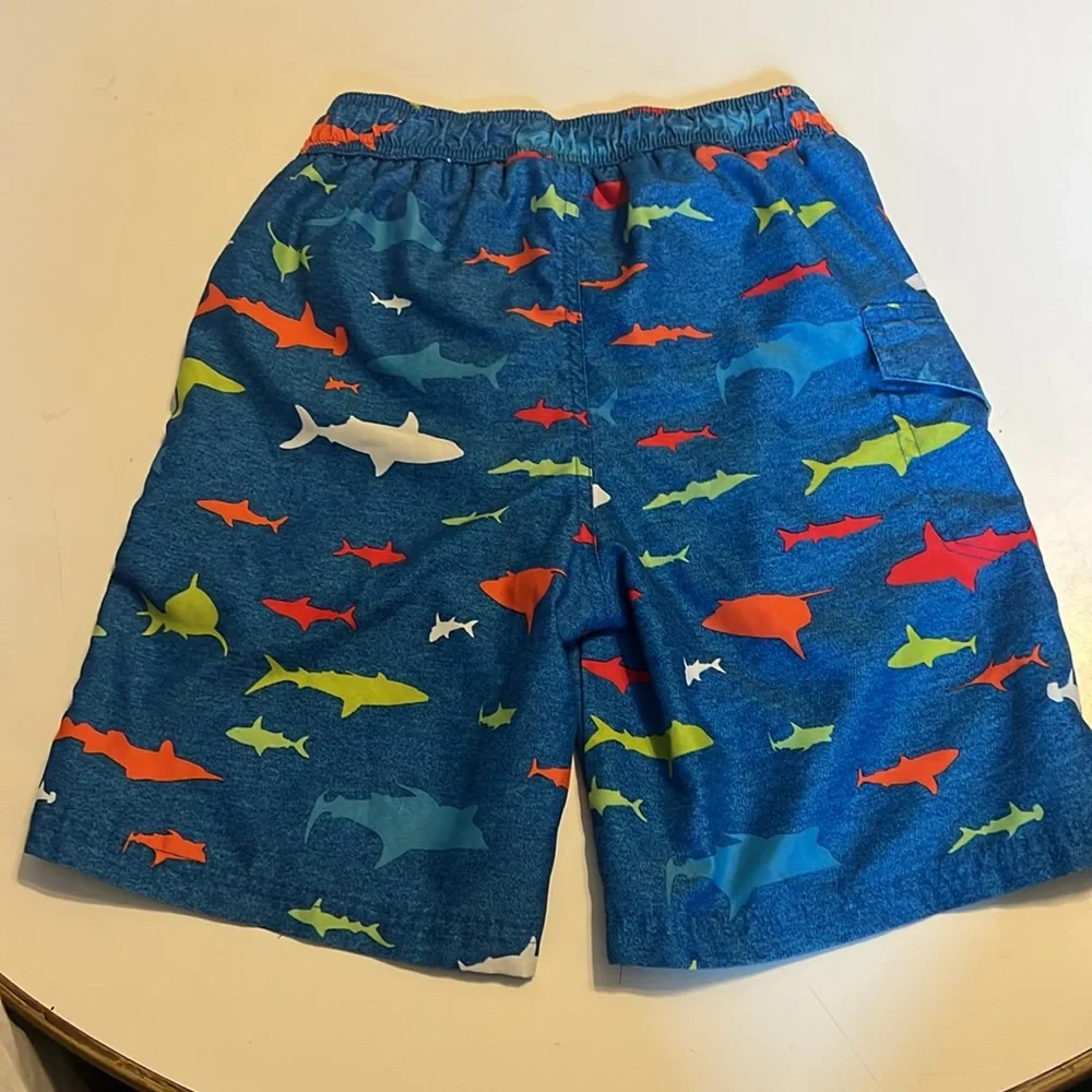 Boys swim shorts sharks functioning pocket like new OT revolution size M 8/10